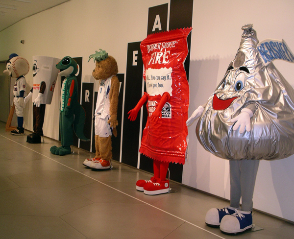 Costumes of mascots show just how much a worker's identity can be subsumed by clothing for the job.