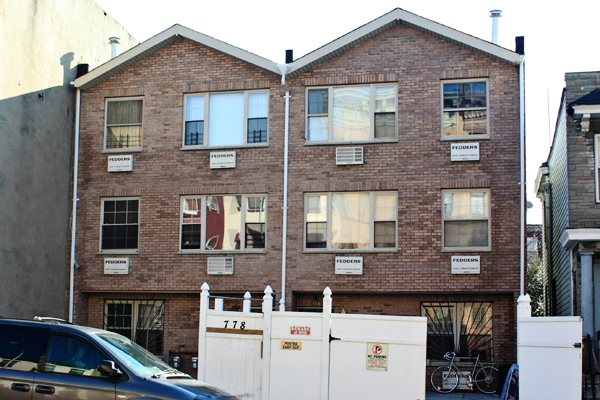 The real estate bust has resulted in the conversion of many recently constructed buildings into rooming houses, including this one in East New York.