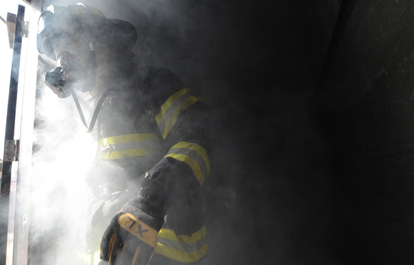 Firefighters' bunker gear protects them from intense heat. But it also very heavy, contributing to the physical exertion that elevates the heart attack risk associated with firefighting.
