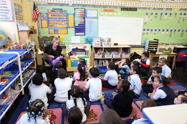 Chancellor-designate Cathie Black reads to a class at PS 109 in the Bronx.