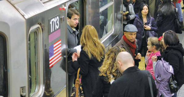 Commuters pack the 7 train at Grand Central Station, rush hour, Friday November 12. The extension of the 7 train to 34th Street and Eleventh Avenue--and maybe even to New Jersey--will be the biggest expansion of the subway system in years.