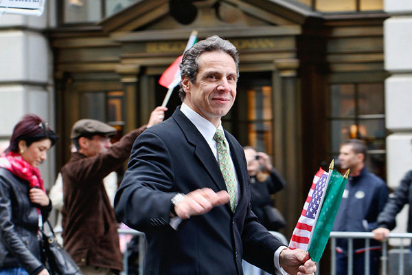 Cuomo marches in 2009 Columbus Day Parade. His bid for governor is unchallenged in Tuesday's primary election and he is well ahead in surveys of the general election.