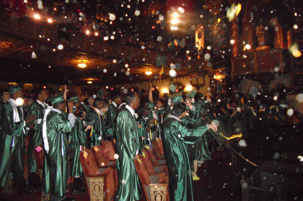 At their commencement ceremony in June, graduates at McKee Career and Technical High School toss their caps into the air. Principal Sharon Henry quoted a Japanese proverb, in saying that McKee grads 