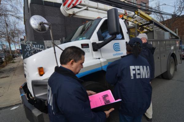 FEMA workers in Red Hook on December 11.