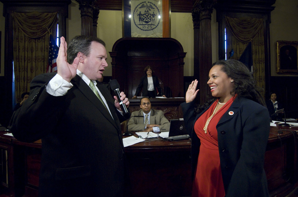 Queens Councilwoman Julissa Ferreras, right, seen getting sworn in to the body back in 2009. One of six Councilmembers facing no opposition on November 5, she also faced no primary challenge this year and no general election opponent in 2009.