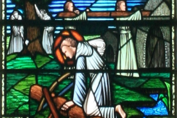 A stained-glass image depicts St. Finian and his followers constructing the abbey at Clonard.