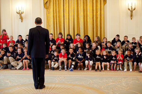 President Barack Obama talks with kids from the Children's Miracle Network in the East Room of the White House, June 9, 2010.