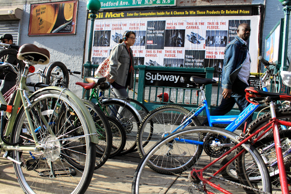 Bikes in Williamsburg hint at two sides of recent zoning activity in New York: the 2005 rezoning in this Brooklyn neighborhood, which led to residential and industrial displacement, and the move by the city in 2009 to tweak zoning rules to encourage developers to offer more parking for bikes.