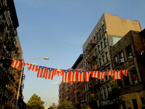 Puerto Rican flags strung across a street in South Williamsburg
