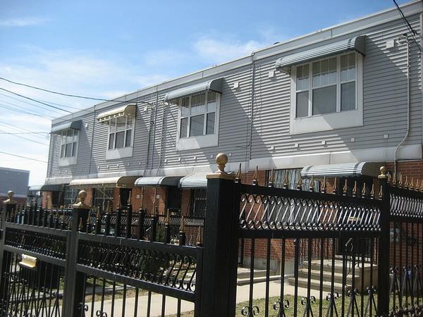 Homes on created by the Nehemiah Program along Snediker Avenue in East New York. Nehemiah and other efforts aimed at and often led by low- and moderate-income residents helped stabilize the area. Now some wonder if gentrification will price those residents out.