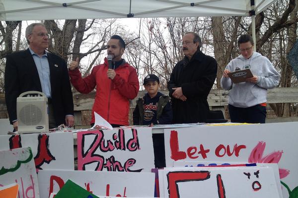 Assemblyman Jeffrey Dinowitz, State Sen. Jose Serrano, Jr. and Congressman Eliot Engel address demonstrators who want the city to take a modest step to repair the damage done to a flagship park by decades of invasive infrastructure projects.