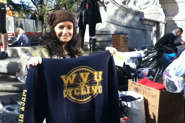 Enybe Merritt, 32, donates to Sandy victims gear she was going to ditch at the starting line of the cancelled Marathon.