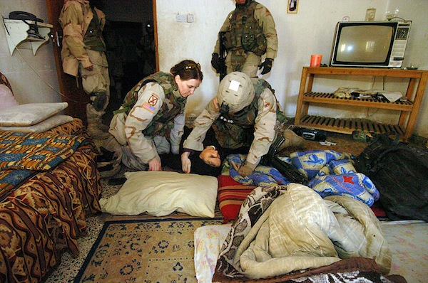 A female U.S. soldier provides first aid to an Iraqi civilian. According to the DOD, some 15 percent of active duty and reserve soldiers, sailors, Marines and Coast Guard and Air Force members are women. According to the GAO, the number of women who end up homeless after leaving the service more than doubled from 2006 to 2010.