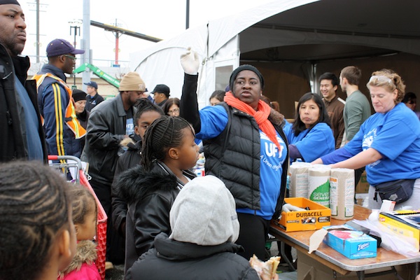 In the aftermath of Hurricane Sandy, volunteer efforts have sometimes been more visible than official government recovery work. From feeding the hungry to treating the sick to doing clean-up work in flooded houses, neighborhood groups and grassroots collectives have coordinated a multifaceted response to the storm.  At left, teachers from central Brooklyn pass out batteries and other supplies to Coney Islanders in the MCU Park parking lot.