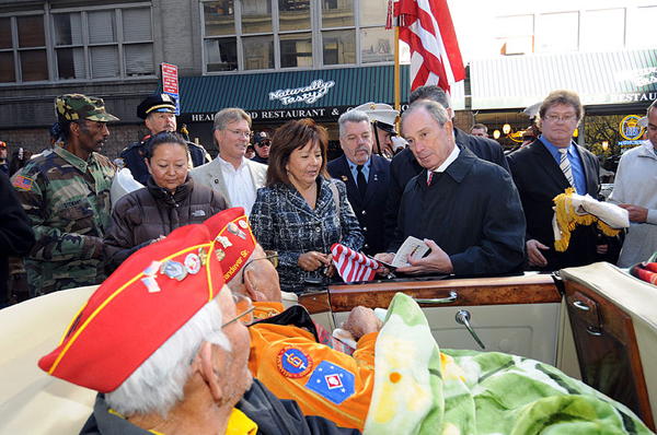 Mayor Bloomberg talks with World War II veterans during the Veterans Day parade in 2010.